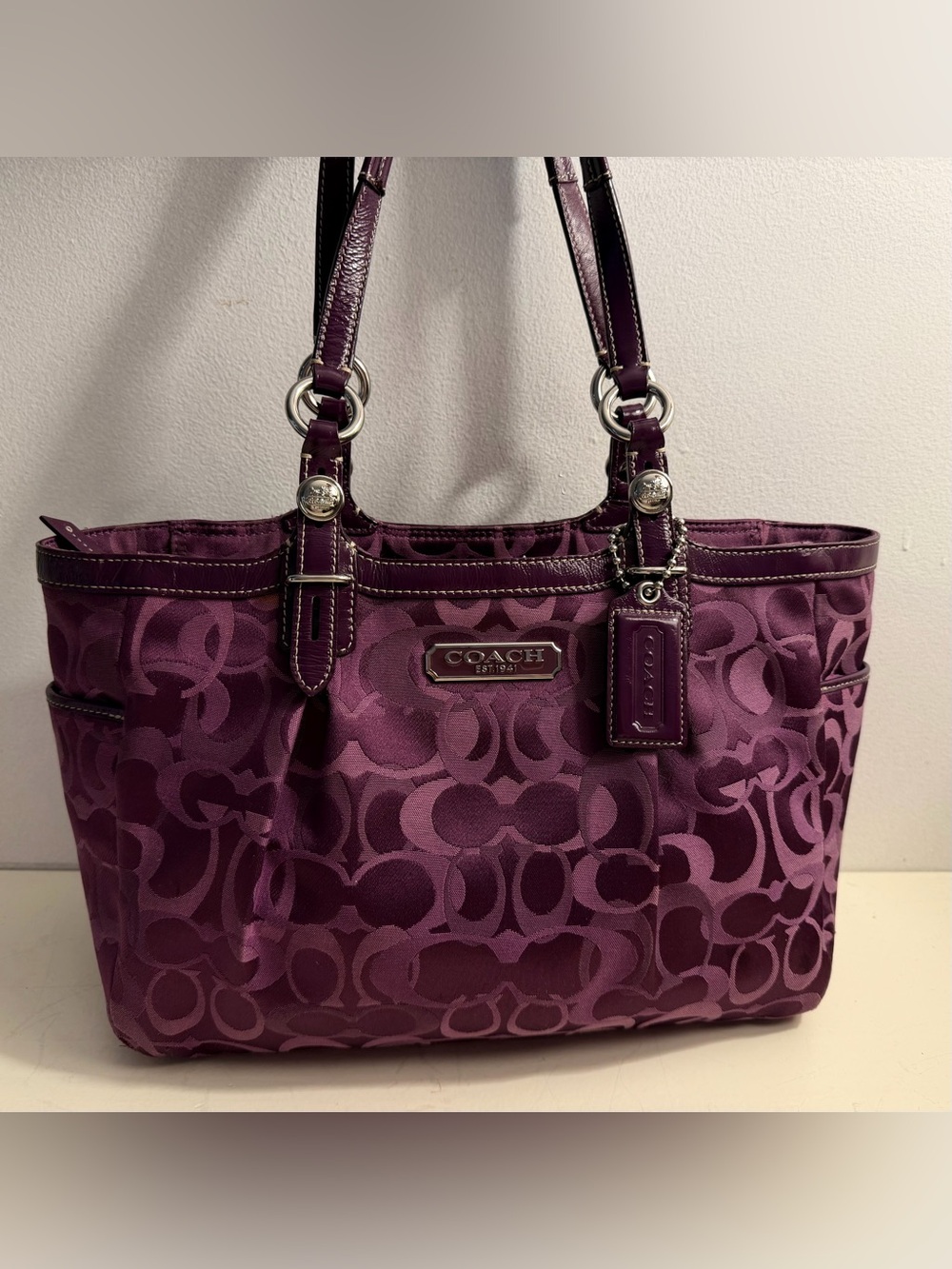 Coach Gallery Optic Signature Tote in a vibrant purple shade.  F1072-F15439